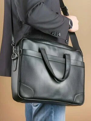 Man Wearing Custom Made Leather Laptop Bag on Shoulder by Vixen Leather