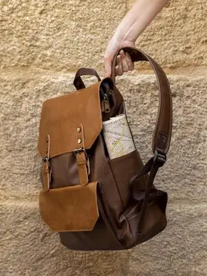 Men Holding Custom Leather backpack By Vixen Leather