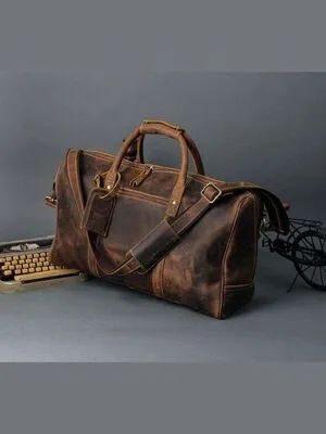 Vintage & Distressed leather duffle bag By Vixen Leather