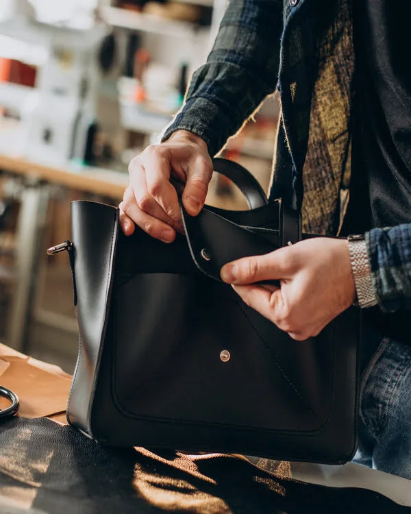 Worker Quality Checking Leather Tote Bag by Vixen Leather